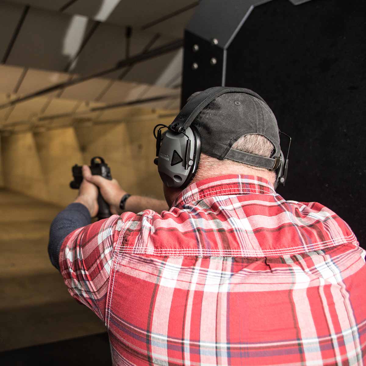 Man uses shooting range at FMJ armory in LaGrange, Georgia.