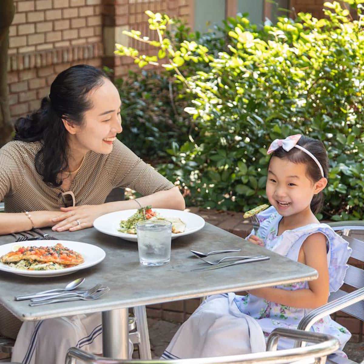 A family dines outdoors at Mare Sol in LaGrange, Georgia.