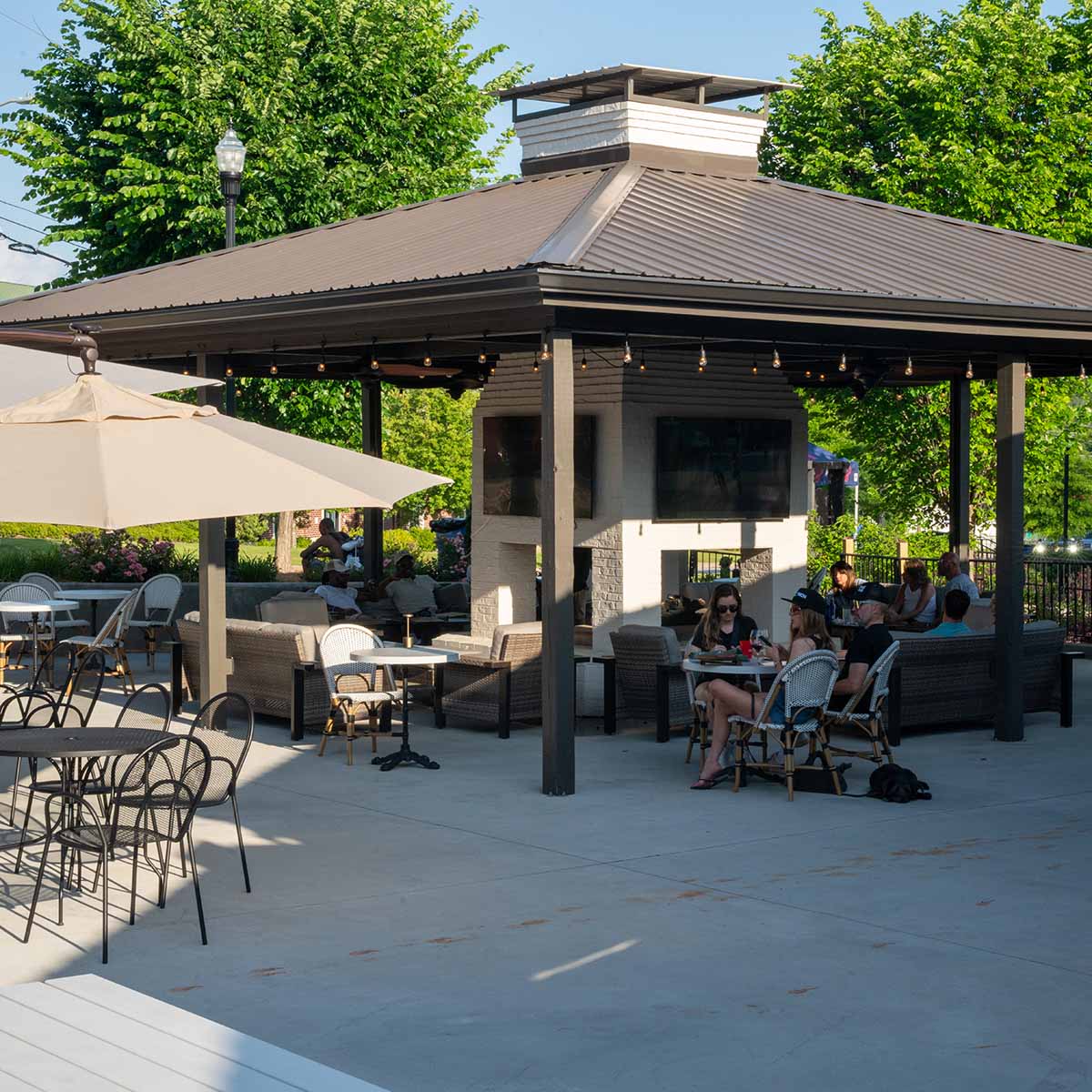The outdoor courtyard and dining area at the Nutwood Winery downtown location in LaGrange, Georgia.