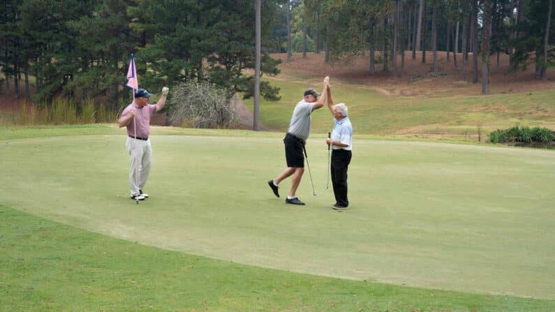 Three men golf at Highland Country Club in LaGrange, Georgia.